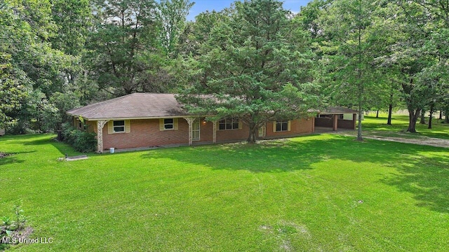 182 Brandon Williamsburg Rd, Mendenhall, MS 39114 - ranch-style home featuring brick siding, a front lawn, a carport, and driveway