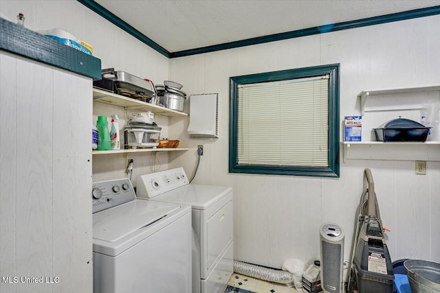 182 Brandon Williamsburg Rd, Mendenhall, MS 39114 - laundry area featuring washing machine and dryer and ornamental molding
