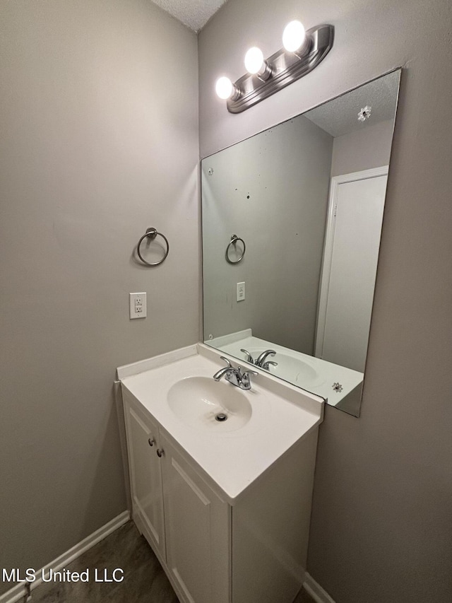 6405 Collinwood Rd, Horn Lake, MS 38637 - bathroom with vanity and baseboards