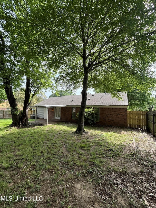 6405 Collinwood Rd, Horn Lake, MS 38637 - view of yard featuring a fenced backyard