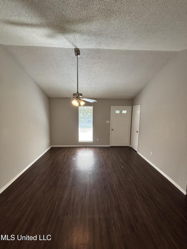 6405 Collinwood Rd, Horn Lake, MS 38637 - unfurnished living room with baseboards, a textured ceiling, ceiling fan, and wood finished floors