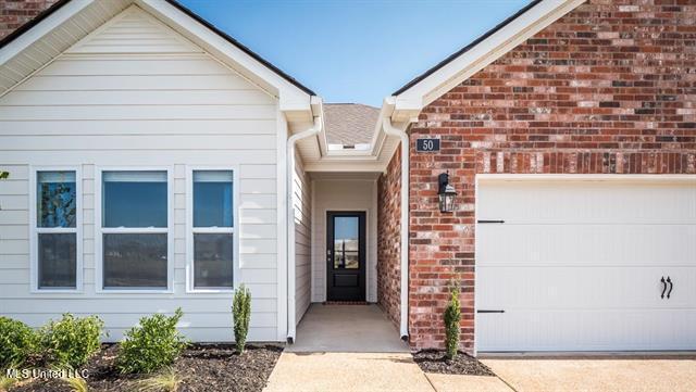 property entrance with a garage