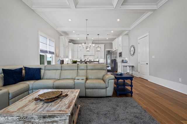 living room featuring coffered ceiling, beamed ceiling, crown molding, an inviting chandelier, and dark hardwood / wood-style flooring