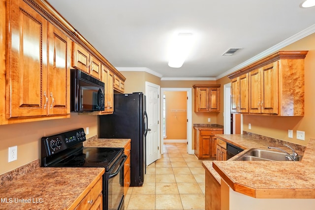 129 E Sunnybrook Rd, Carriere, MS 39426 - kitchen featuring black appliances, a sink, crown molding, brown cabinets, and light countertops