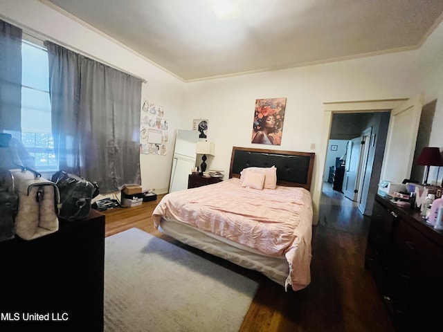58 Snider St, Grenada, MS 38901 - bedroom with dark wood-style flooring