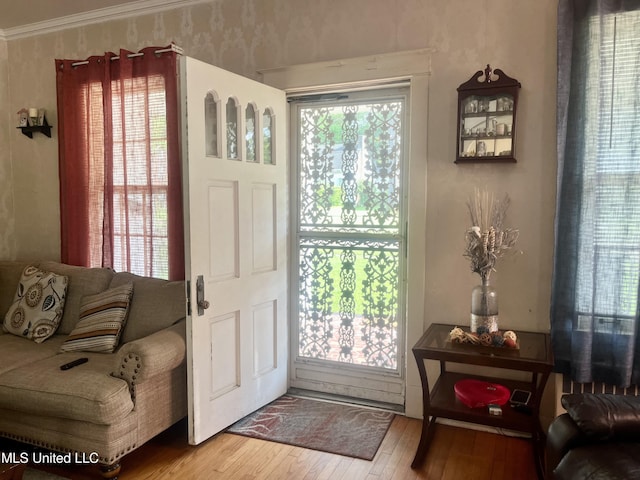 58 Snider St, Grenada, MS 38901 - foyer entrance featuring hardwood / wood-style floors and crown molding