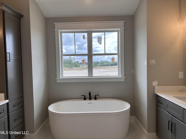 1740 Bakersfield Way, Nesbit, MS 38651 - bathroom featuring vanity, marble finish flooring, and baseboards
