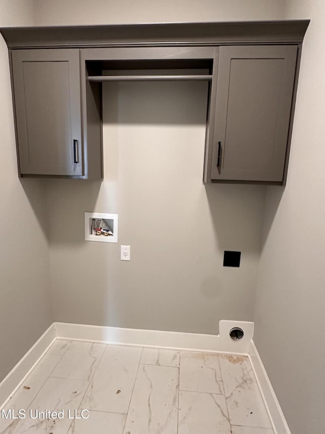 1740 Bakersfield Way, Nesbit, MS 38651 - laundry room featuring marble look tile flooring, baseboards, washer hookup, electric dryer hookup, and cabinet space