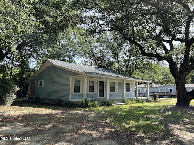 97131 Kapalama Dr, Diamondhead, MS 39525 - view of front of property featuring a porch and central AC