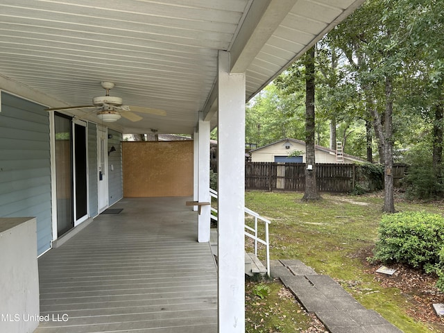 97131 Kapalama Dr, Diamondhead, MS 39525 - wooden terrace with ceiling fan