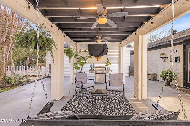 view of patio / terrace featuring area for grilling and ceiling fan