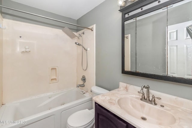 bathroom featuring shower / bathtub combination, toilet, and vanity