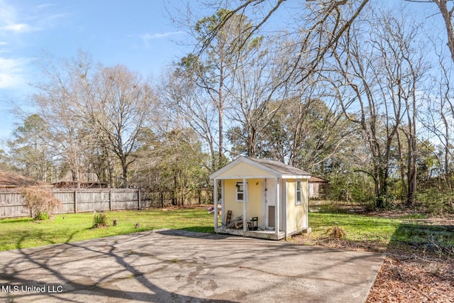 view of outdoor structure with an outdoor structure and fence private yard