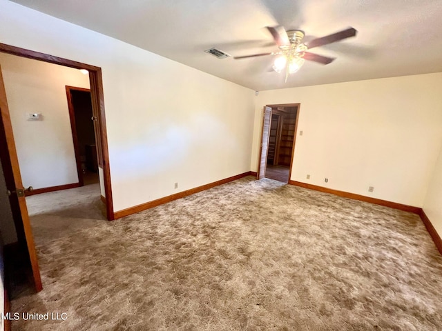 unfurnished room featuring carpet flooring and ceiling fan