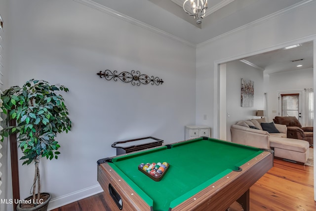 game room with hardwood / wood-style flooring, pool table, and ornamental molding