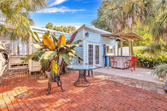 253 Sycamore St, Bay Saint Louis, MS 39520 - view of patio / terrace featuring french doors and outdoor dry bar