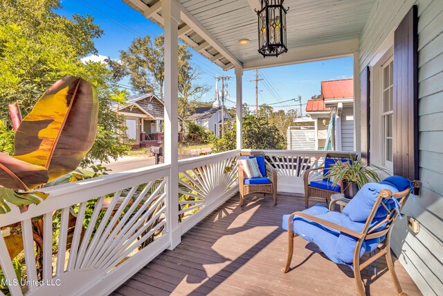 253 Sycamore St, Bay Saint Louis, MS 39520 - deck with a porch