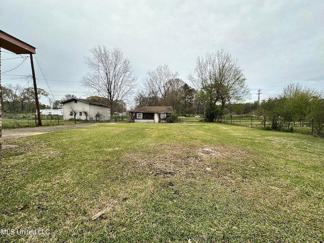 view of yard featuring fence