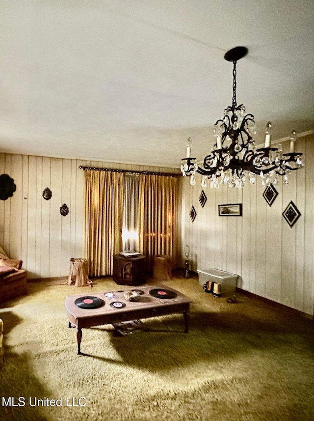 unfurnished living room with a notable chandelier and carpet