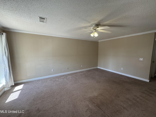 empty room with crown molding, ceiling fan, a textured ceiling, and dark colored carpet