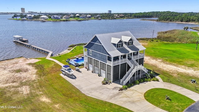 drone / aerial view with a water view