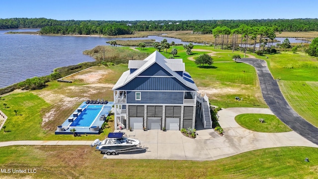 drone / aerial view with a water view