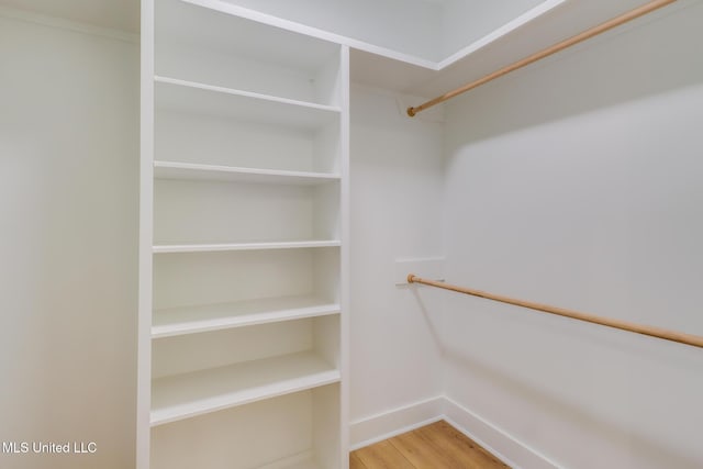 4054 Mallard St, Bay Saint Louis, MS 39520 - walk in closet with wood finished floors
