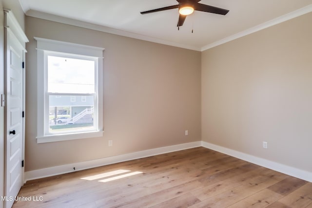 4054 Mallard St, Bay Saint Louis, MS 39520 - unfurnished room featuring ceiling fan, ornamental molding, light wood-style floors, and baseboards