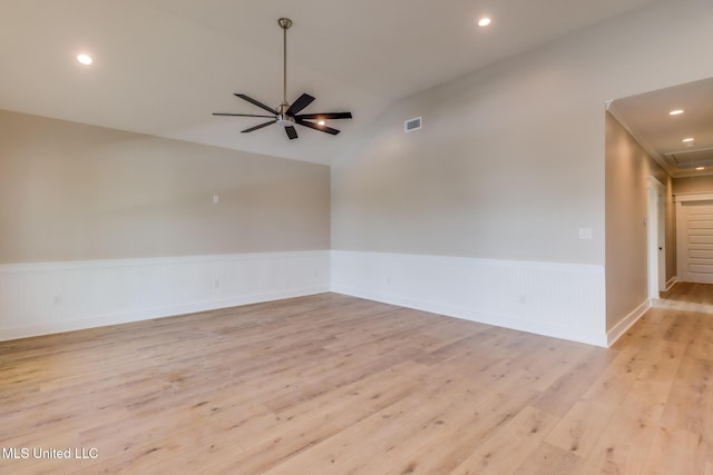 4054 Mallard St, Bay Saint Louis, MS 39520 - spare room with light wood-type flooring, a wainscoted wall, recessed lighting, lofted ceiling, and a ceiling fan