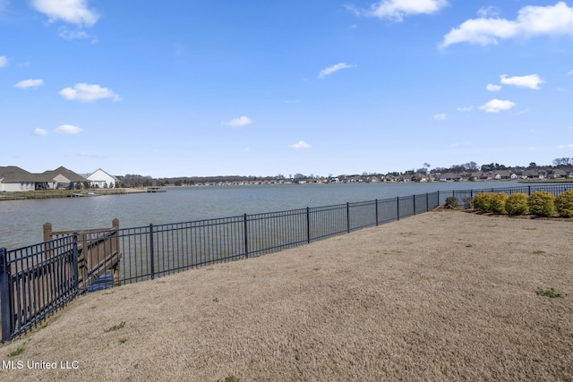 water view with a fenced backyard