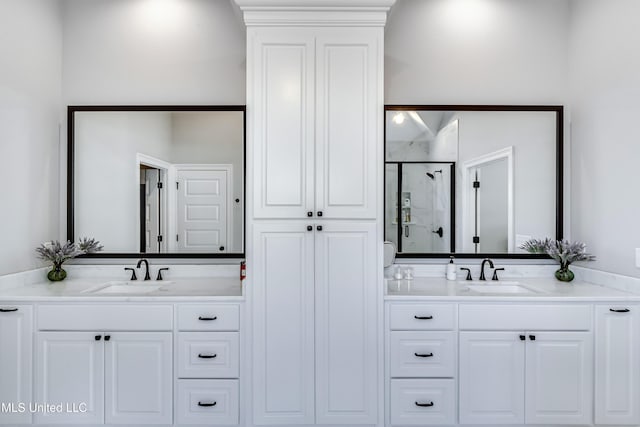 bathroom featuring vanity and walk in shower