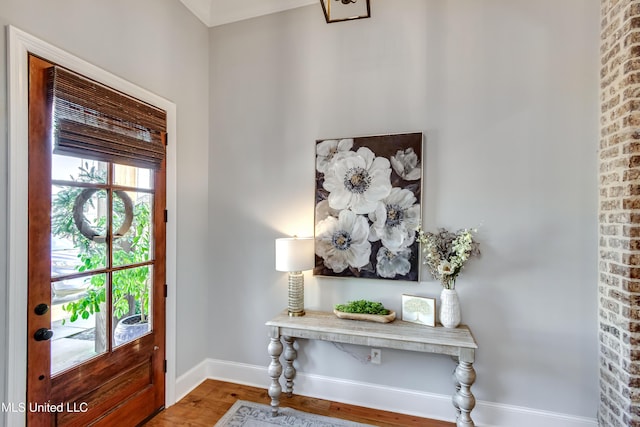 foyer with wood-type flooring