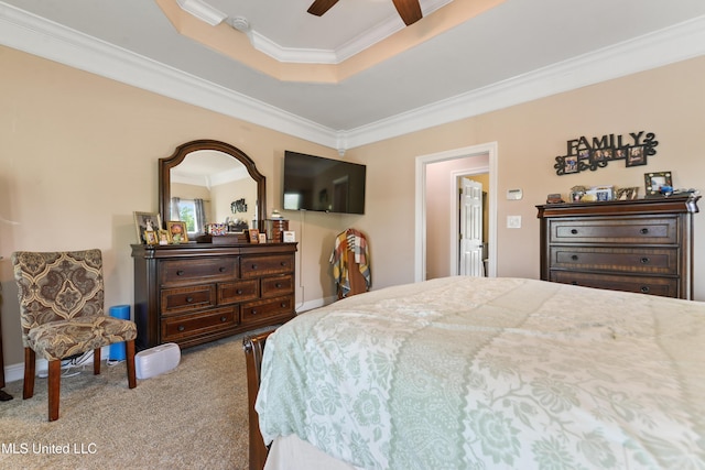 12441 Old Cypress Creek Cv, Diberville, MS 39540 - bedroom featuring crown molding, carpet floors, a raised ceiling, and a ceiling fan