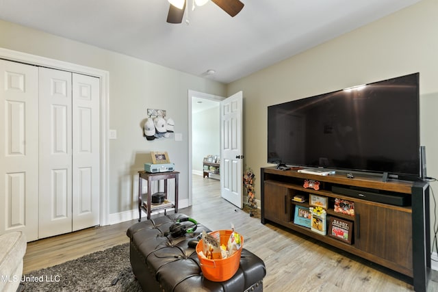 12441 Old Cypress Creek Cv, Diberville, MS 39540 - living room with ceiling fan and wood finished floors