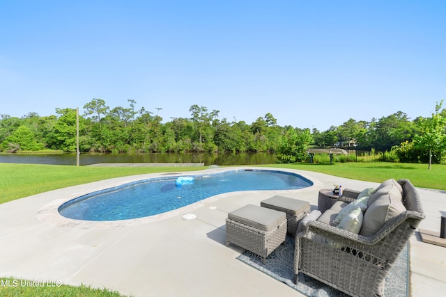 12441 Old Cypress Creek Cv, Diberville, MS 39540 - swimming pool featuring a yard, a patio area, view of wooded area, and a water view