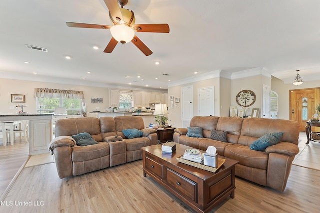 12441 Old Cypress Creek Cv, Diberville, MS 39540 - living area featuring a ceiling fan, light wood finished floors, recessed lighting, and ornamental molding