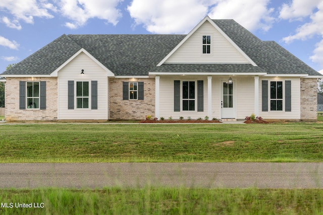 view of front of property with a front lawn