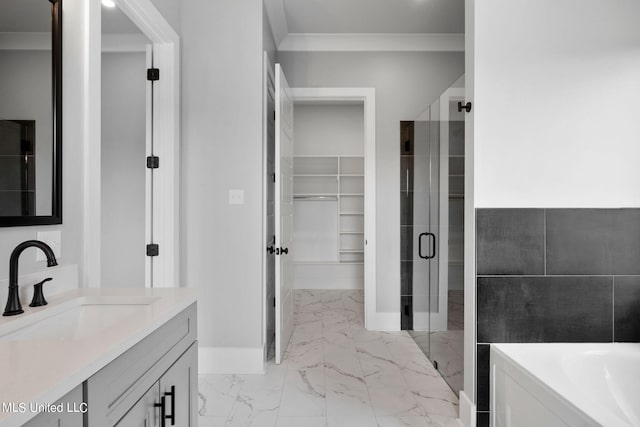 bathroom with vanity, crown molding, and shower with separate bathtub