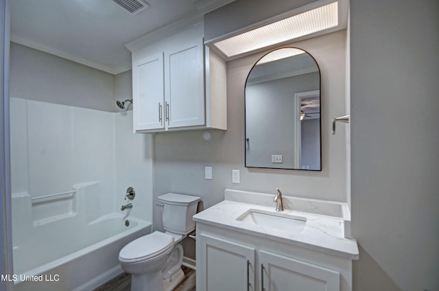 full bathroom with vanity, ornamental molding, shower / bathing tub combination, and toilet