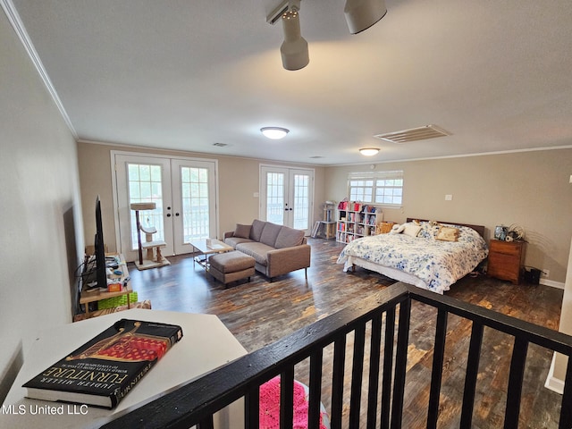 906 W Lakeshore Dr, Carriere, MS 39426 - bedroom featuring french doors, access to outside, ornamental molding, wood finished floors, and baseboards