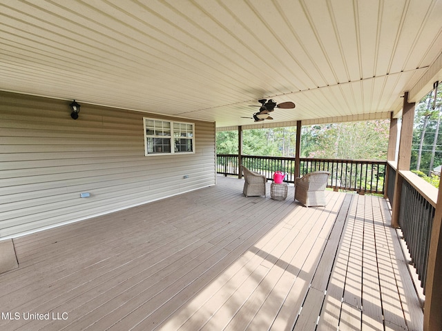 906 W Lakeshore Dr, Carriere, MS 39426 - wooden deck with a ceiling fan