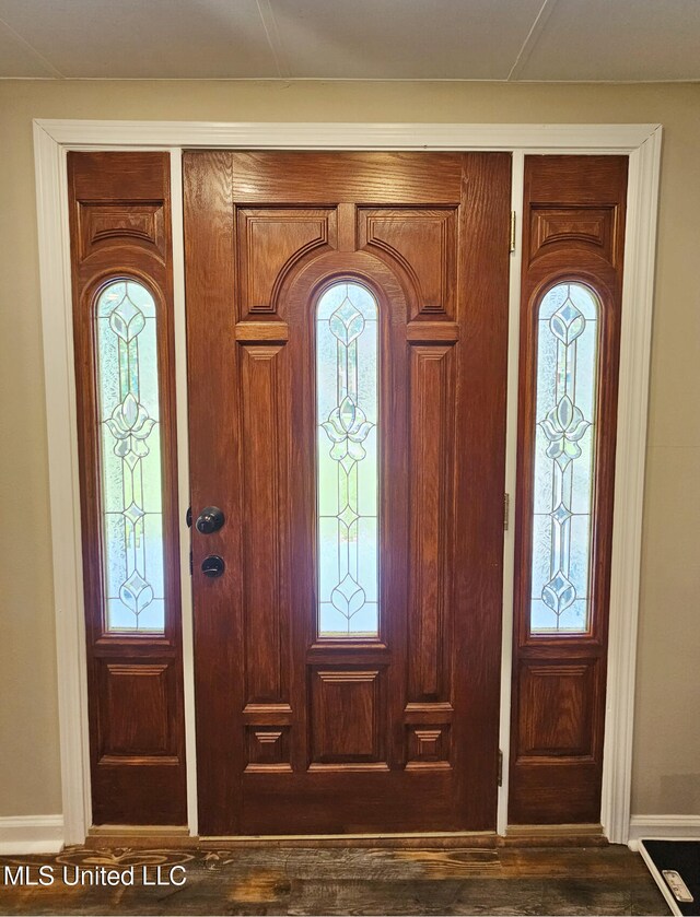 906 W Lakeshore Dr, Carriere, MS 39426 - entryway with baseboards and wood finished floors