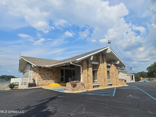 906 W Lakeshore Dr, Carriere, MS 39426 - view of building exterior featuring uncovered parking