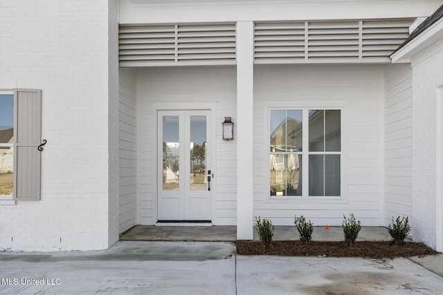 doorway to property with french doors