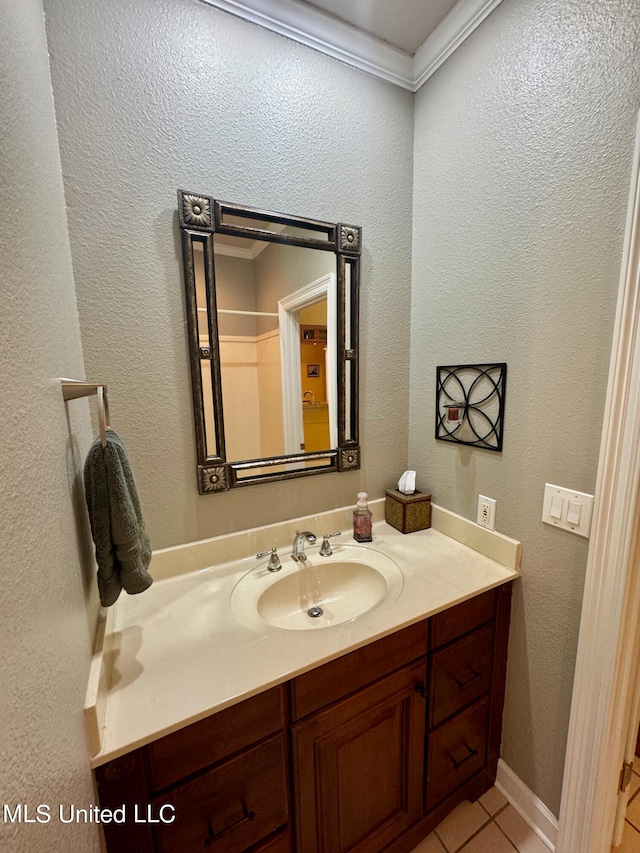 bathroom with vanity and tile patterned floors