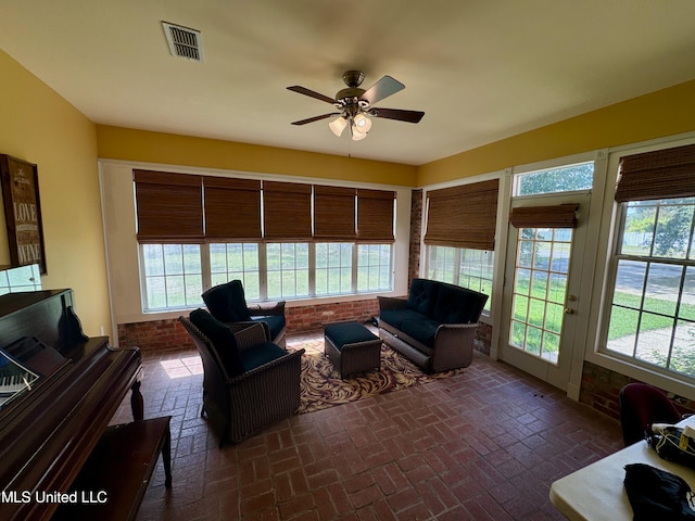 living room featuring ceiling fan