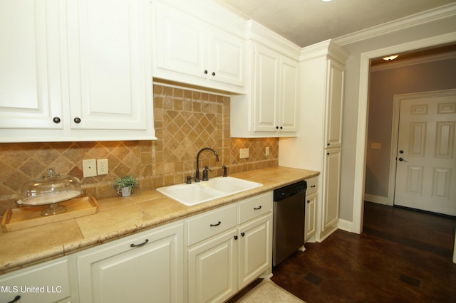 kitchen featuring ornamental molding, decorative backsplash, light countertops, a sink, and stainless steel dishwasher