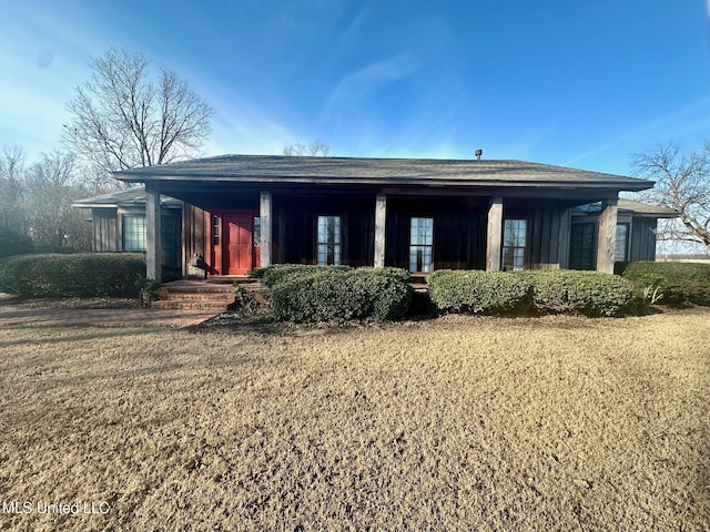 exterior space with a front yard