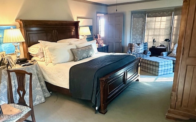 bedroom featuring carpet and ornamental molding