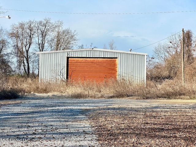 view of outbuilding featuring a garage